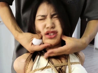 Chinese bondage – Hogtied & gagged in boots